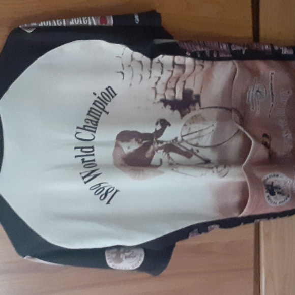 A beige cream and black biker shirt in good condition ready for u to sport - Picture 2 of 2